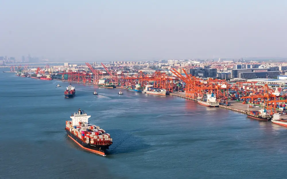 Container port with a departing container vessel