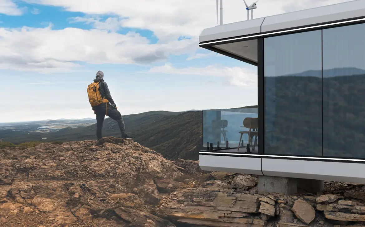 Cabin with panoramic glazing on a mountain ridge